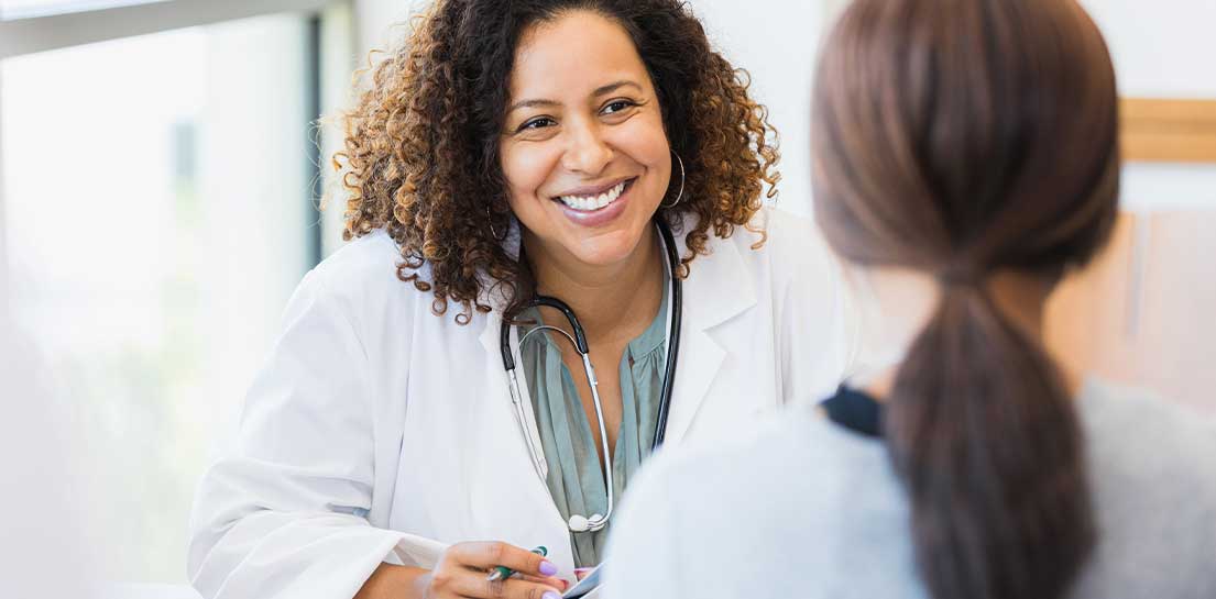 Female doctor with patient